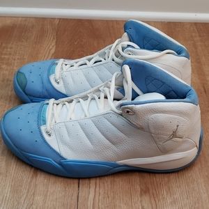 Worn sky blue and white Jordans